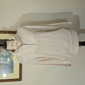 Workshop, modal, cream colored pullover top with pockets.